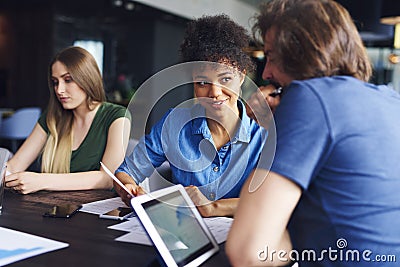 Young adults coworkers having business meeting Stock Photo