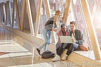 3 young adults entrepreneurs or students group mixed race around Stock Photo