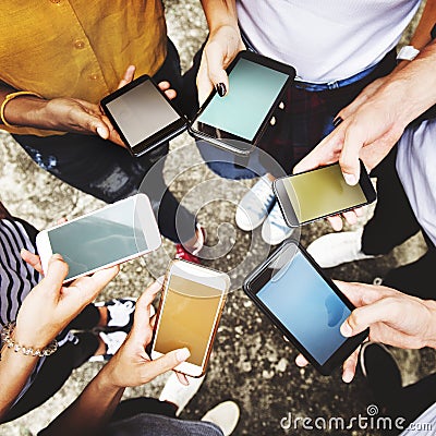 Young adults using smartphones in a circle social media and conn Stock Photo