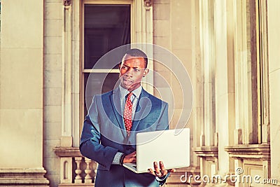 Young African American Businessman working in New York. Stock Photo