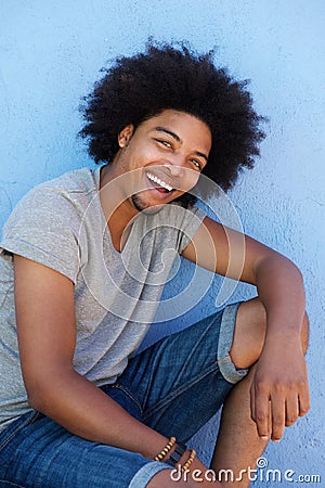 Young african american man with afro smiling Stock Photo