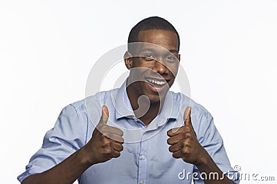 Young African American man giving thumbs up, horizontal Stock Photo
