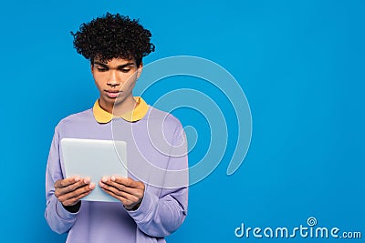 young african american man in purple Stock Photo