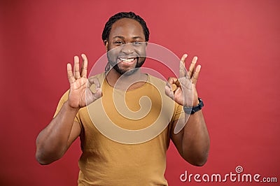 Young African American man showing okay sign Stock Photo