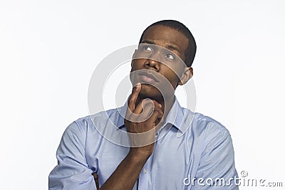 Young African American thinking and looking up, horizontal Stock Photo