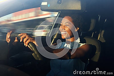 Young african american woman driving a car Stock Photo