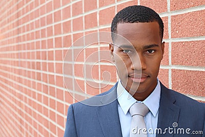 Young African entrepreneurial achiever looking confidently at camera with copy space Stock Photo