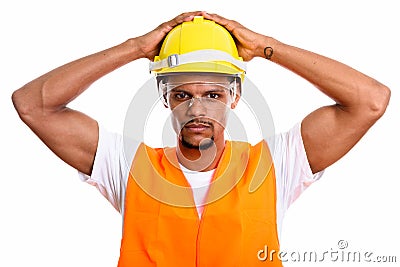 Young African man construction worker with both hands on safety Stock Photo