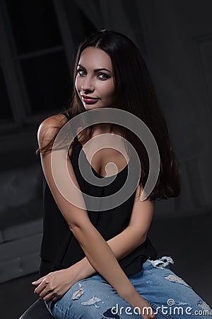 Young alluring lady posing in studio Stock Photo