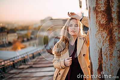 Young amazing pretty girl on the roof Stock Photo