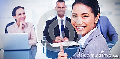 Young applicant giving thumb up after obtaining the job Stock Photo