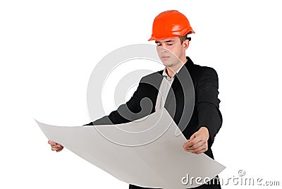 Young architect or engineer studying a plan Stock Photo