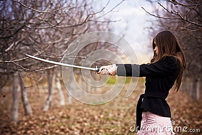 Young armed woman Stock Photo
