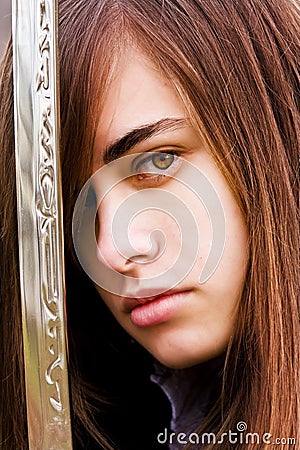 Young armed woman Stock Photo