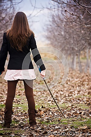 Young armed woman Stock Photo