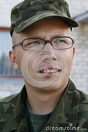 Young army cadet with glasses Stock Photo