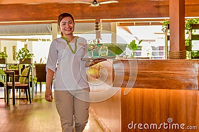 Young asian beautiful waitress smiling Editorial Stock Photo