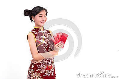 Young Asian beauty woman wearing cheongsam and holding packet of Stock Photo