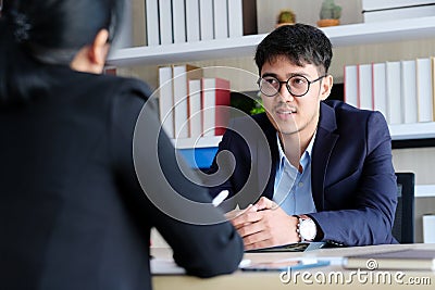 Young asian businessman at business meeting, job interview, in office, business people, office lifestyle concept Stock Photo