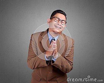 Young Businessman Regret, Apologize Gesture Stock Photo