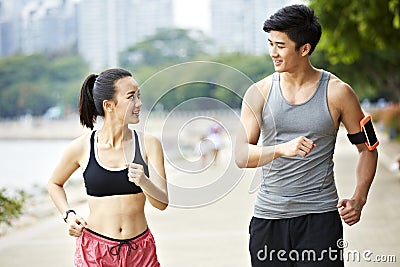 https://thumbs.dreamstime.com/x/young-asian-couple-jogging-outdoors-men-women-running-park-looking-each-other-talking-76697502.jpg