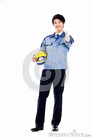 Young Asian engineer showing thumb. Stock Photo