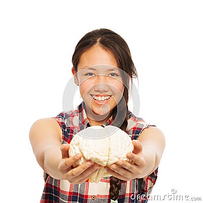 Young Asian girl holds cerebrum model in her hand Stock Photo