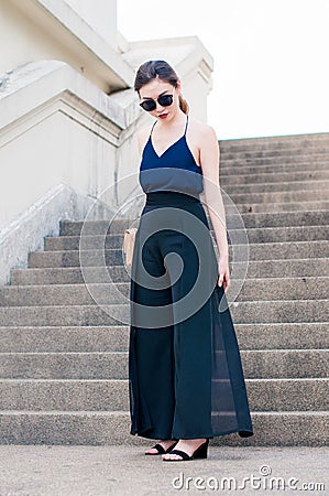 Young Asian Girl on Stairway Stock Photo