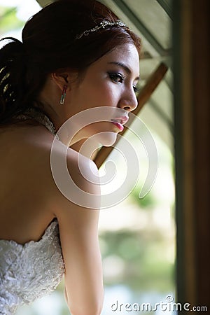 Young Asian lady in white bride dress Editorial Stock Photo