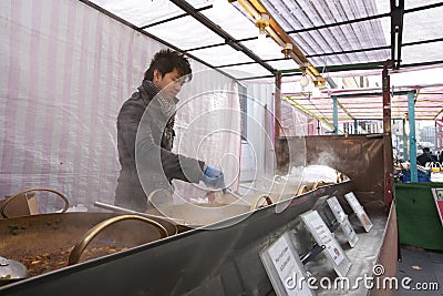 Young Asian man cooking Thai food Stock Photo