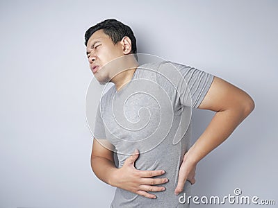 Man Suffers From Appendix Inflamation Stock Photo