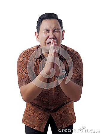 Young Man Regret, Apologize Gesture Stock Photo