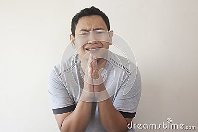 Young Man Regret, Apologize Gesture Stock Photo