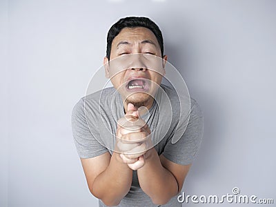 Young Man Regret, Apologize Gesture Stock Photo