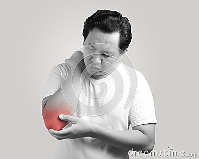 Young Man Having Elbow Pain Stock Photo