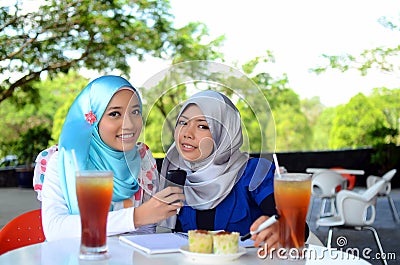 Young asian muslim woman in head scarf Stock Photo