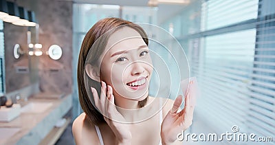 Woman use oil blotting paper Stock Photo