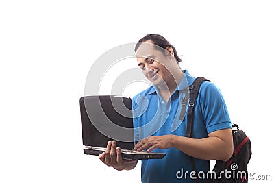 Young Asian Student With Laptop. Smiling Happily Stock Photo