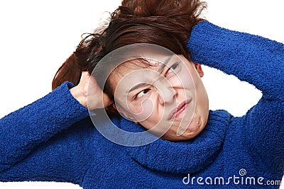 Young Asian woman demented Stock Photo