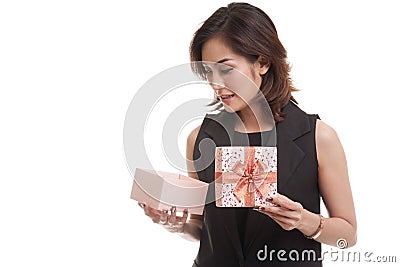 Young Asian woman open a gift box. Stock Photo