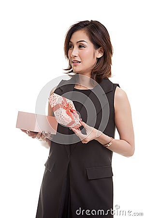 Young Asian woman open a gift box. Stock Photo