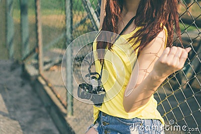 Young asian woman photographer tourist girl posing outdoor Stock Photo