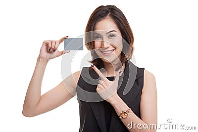 Young Asian woman point to a blank card. Stock Photo