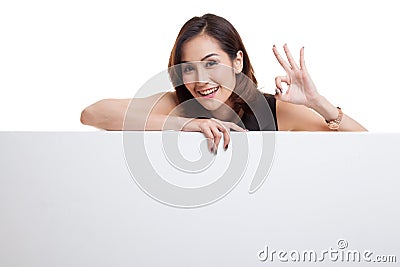 Young Asian woman show OK with blank sign. Stock Photo