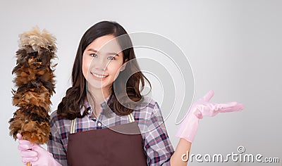 Asian woman cleaning home Stock Photo