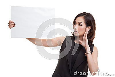 Young Asian woman surprise with white blank sign. Stock Photo