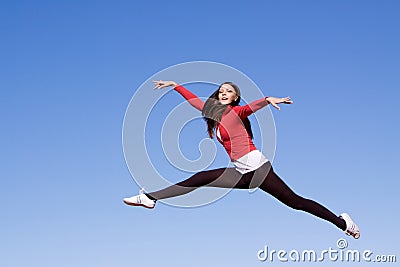 Young athletic woman jumping Stock Photo
