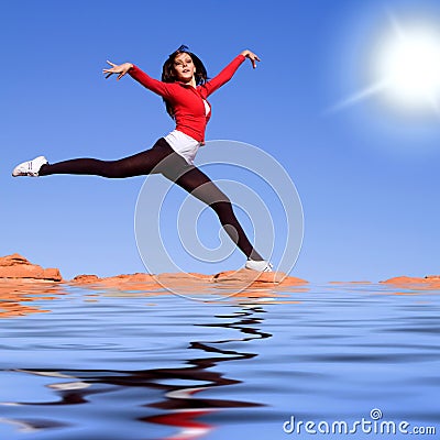 Young athletic woman jumping on the water Stock Photo