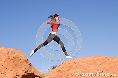 Young athletic woman running Stock Photo