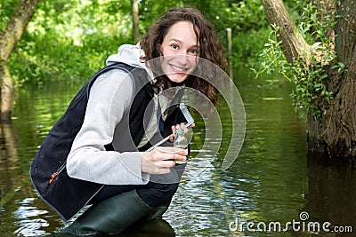 Young attractive biologist woman working on water analysis Stock Photo